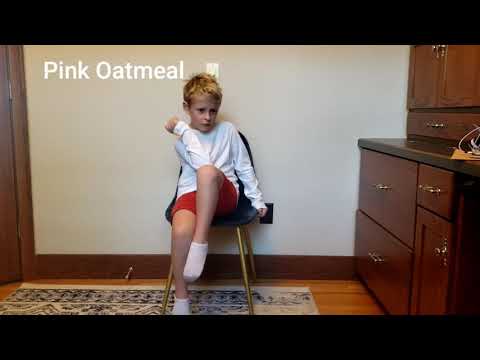 Opposite Elbow to Knee Seated