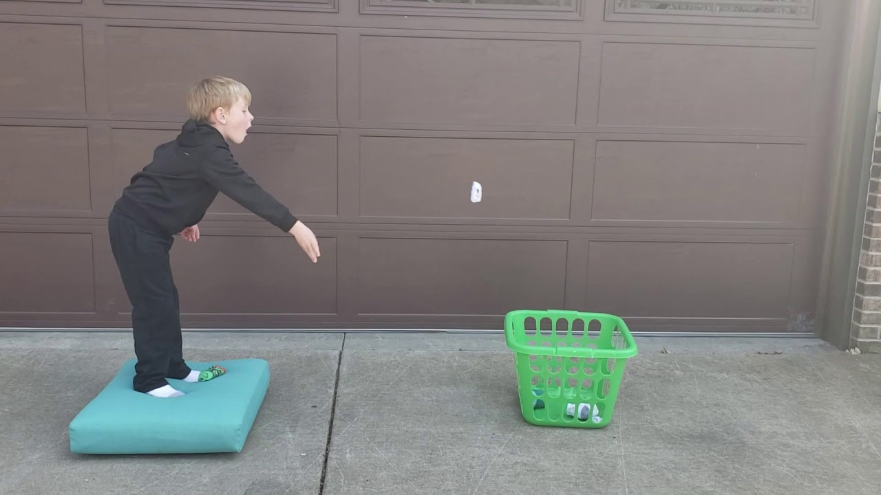 Squat and Toss Unstable Surface